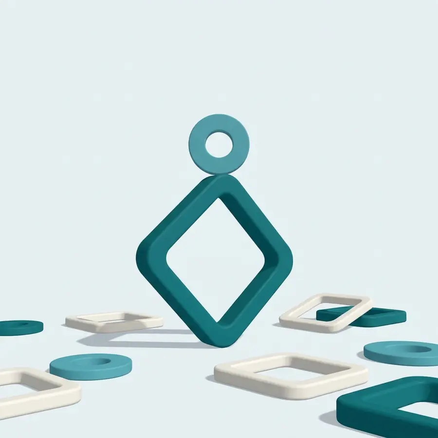 A ring balanced on the corner of a rounded square